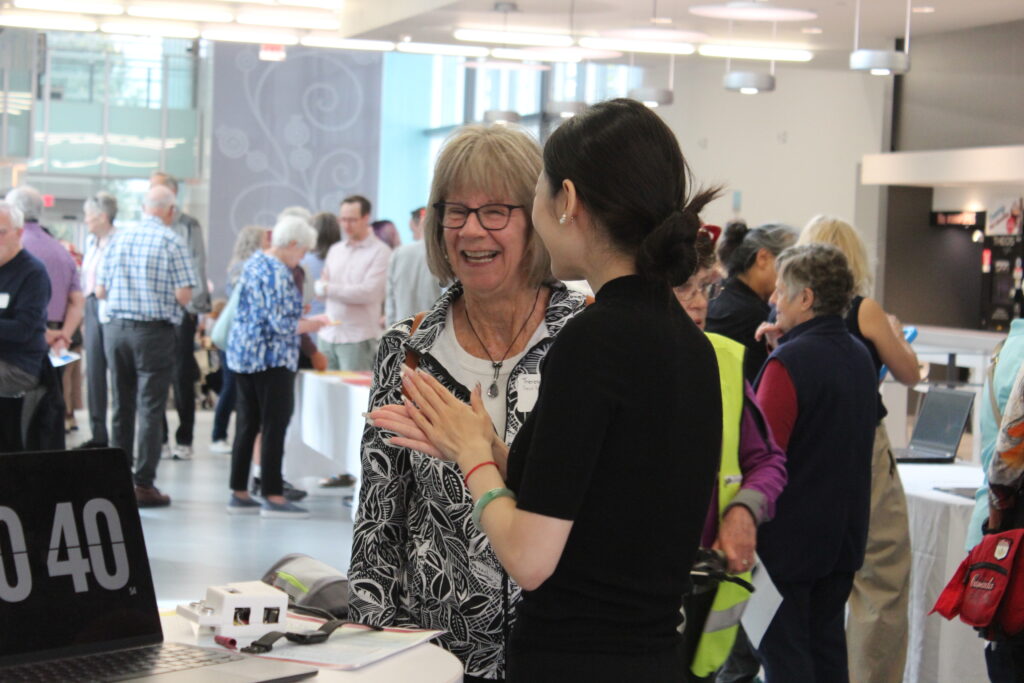 Researcher and Mac engAGE attendee laughing