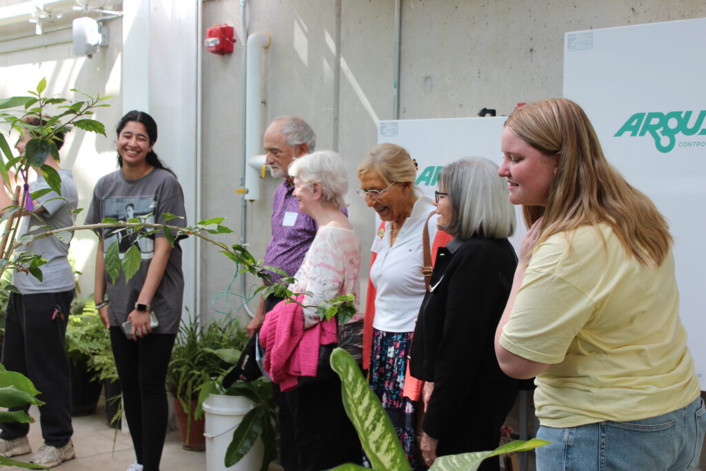 Student volunteers and attendees at the McMaster Biology Greenhouse