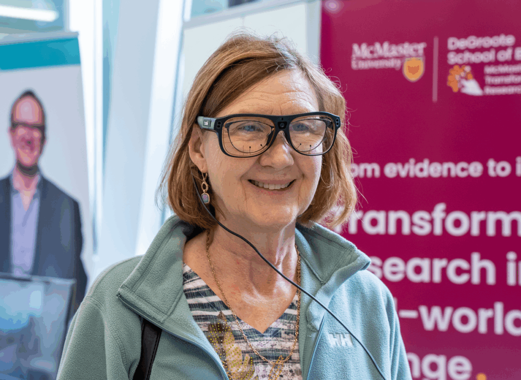 Mac engAGE attendee wearing glasses 
