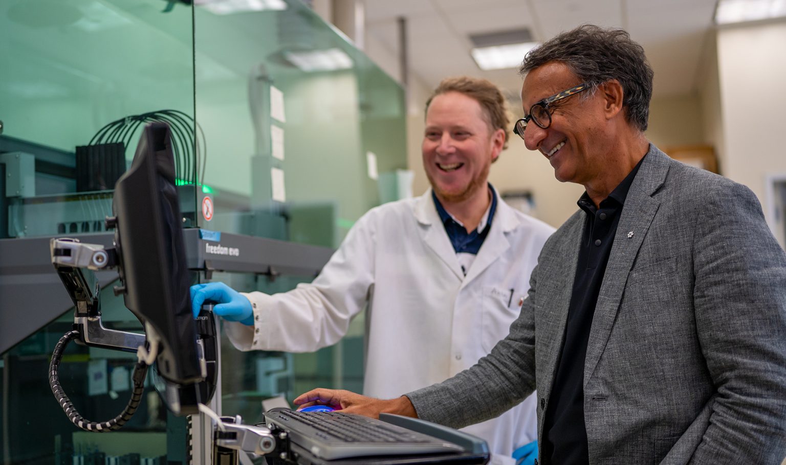 Research technician Alexander Tough, left, works with Parminder Raina, lead principal investigator of the Canadian Longitudinal Study on Aging, in a laboratory at the CLSA’s home base at McMaster Innovation Park.

