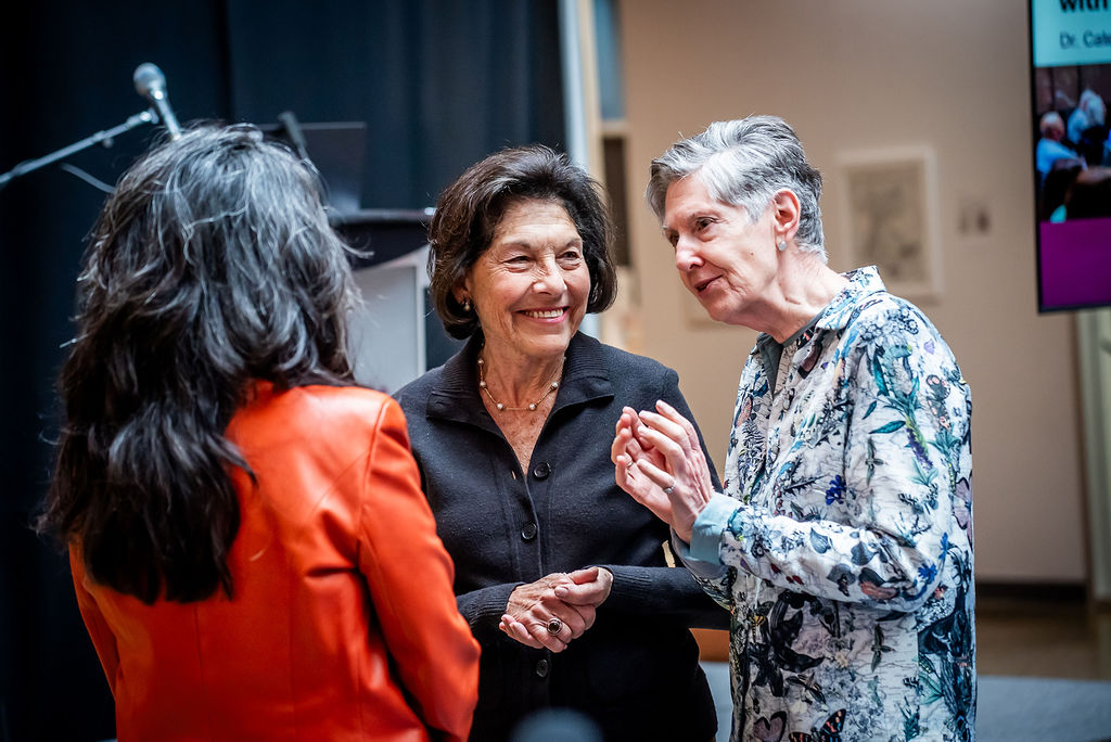 Caterina Rosano, Susan Denburg and Suzanne Labarge talk to each other